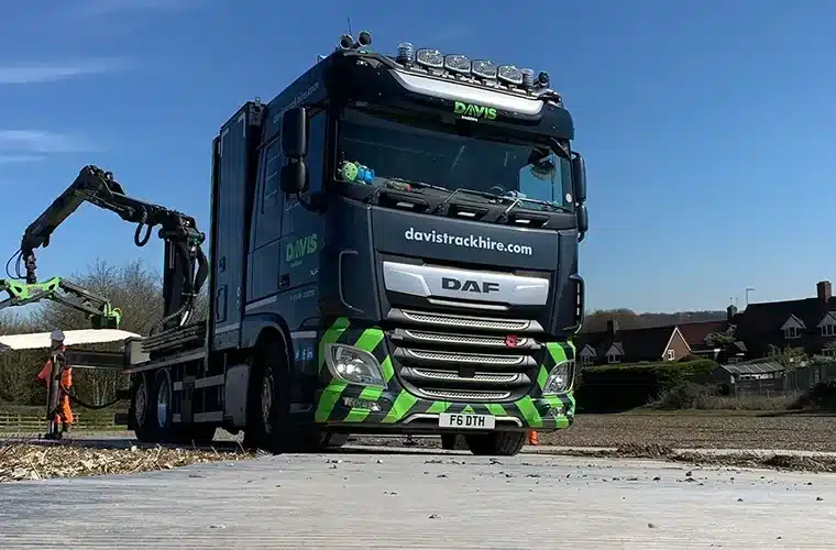 David Trackhire Scania truck laying ground protection