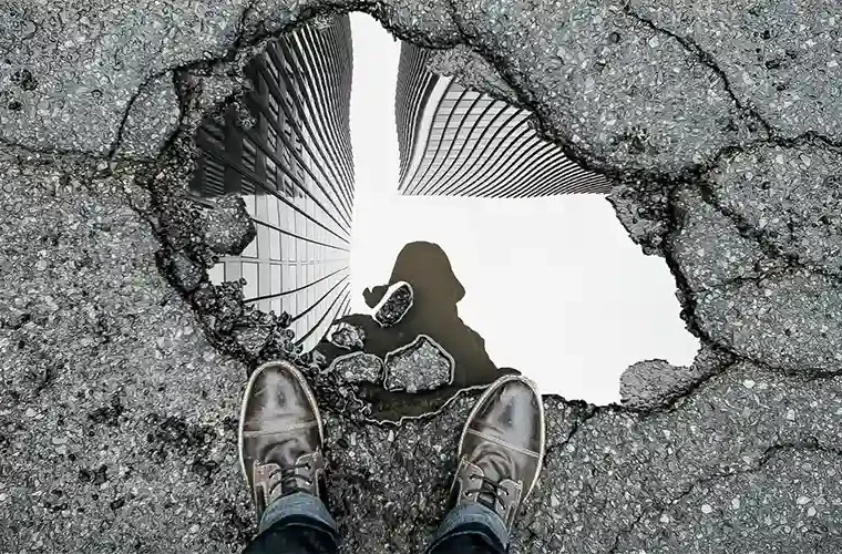 Pothole in road | pedestrian walkway safety